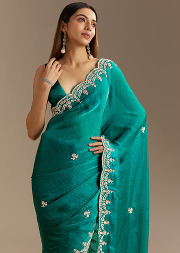 Teal Green Satin Saree With Zardosi Moti Embroidery And Scallop Border