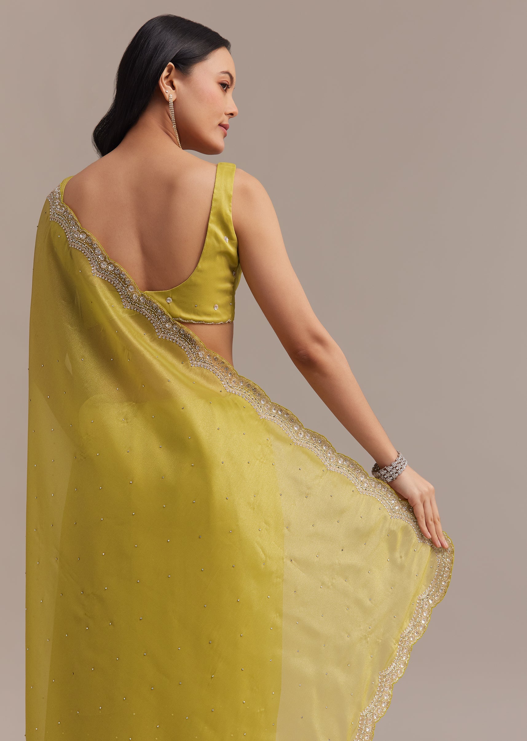 Mustard Tissue Organza Saree With Sequins Embellished Border