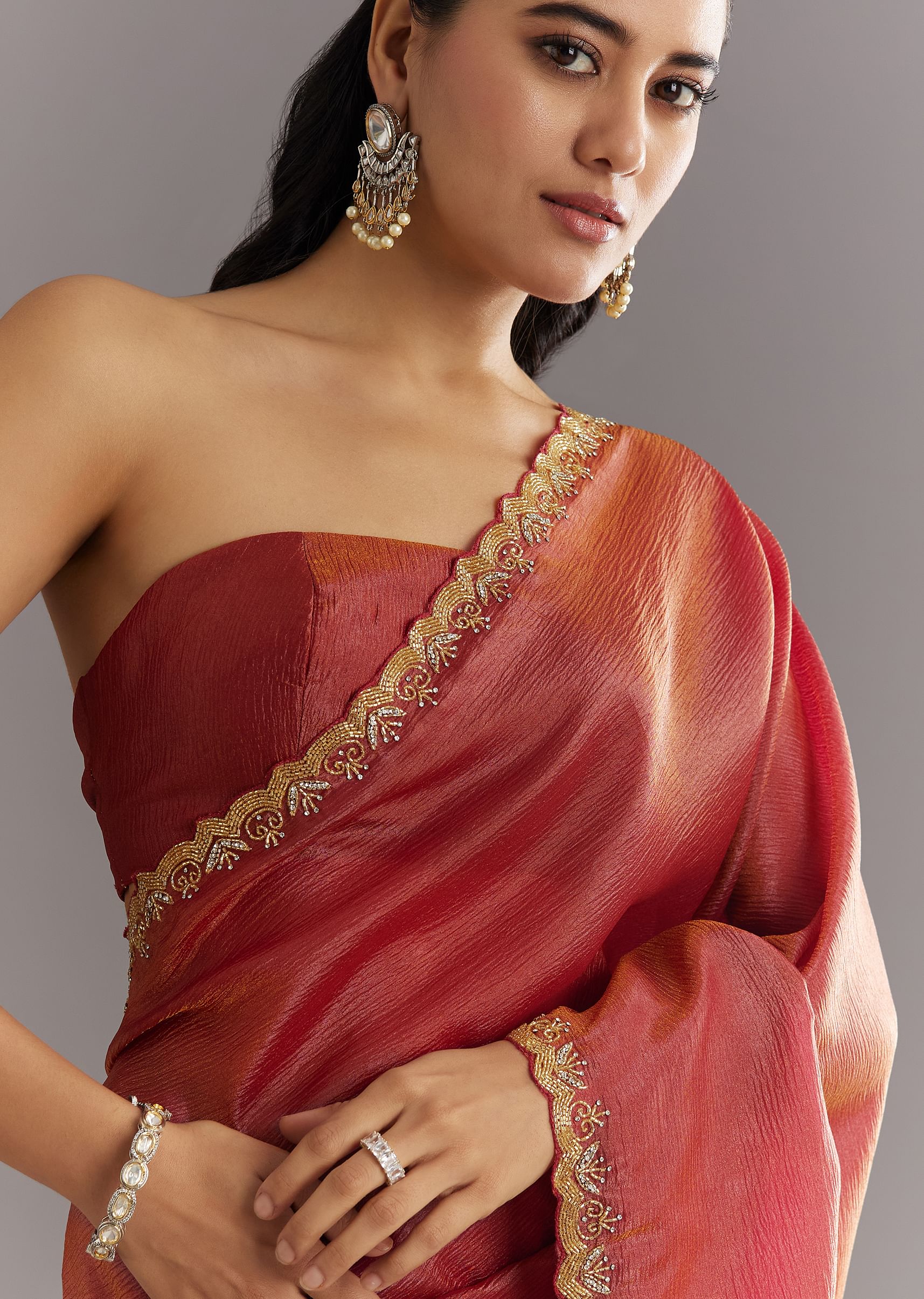Dusky Brown Crushed Tissue Saree With Stones Cutdana Embroidered Scallop Border