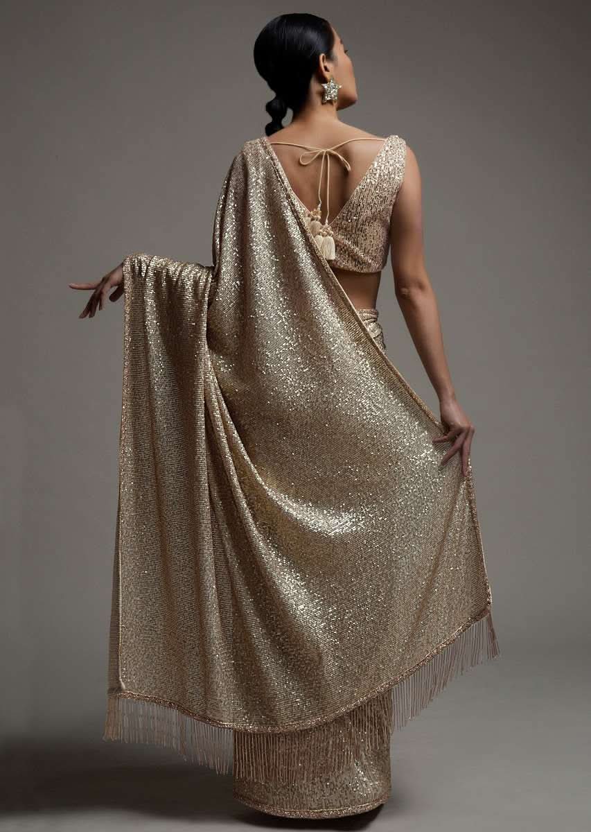 Gold Beige Saree Embellished In Sequins With Fringes On The Pallu And Unstitched Blouse