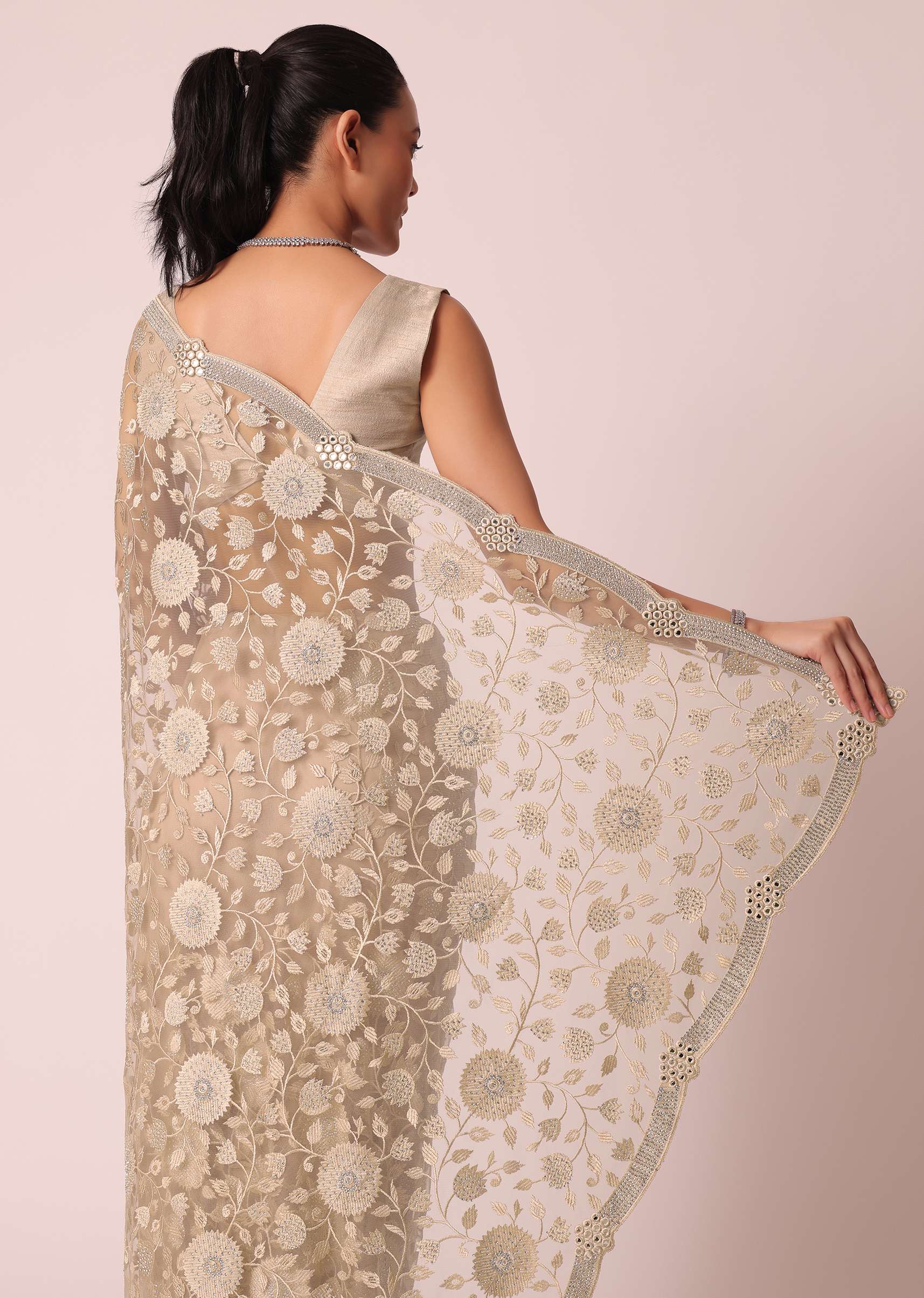 Gold Net Saree With Stone Studded And Florar work And Unstitched Blouse Piece