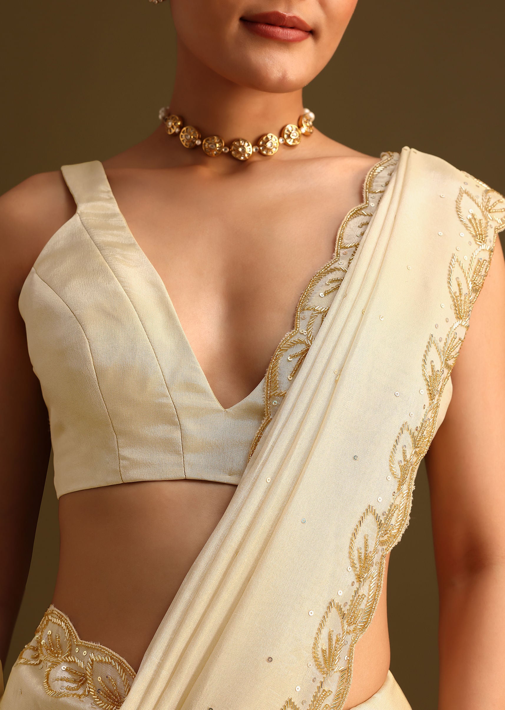 Ivory Tissue Saree With Cutdana Embroidered Border and Unstitched Blouse