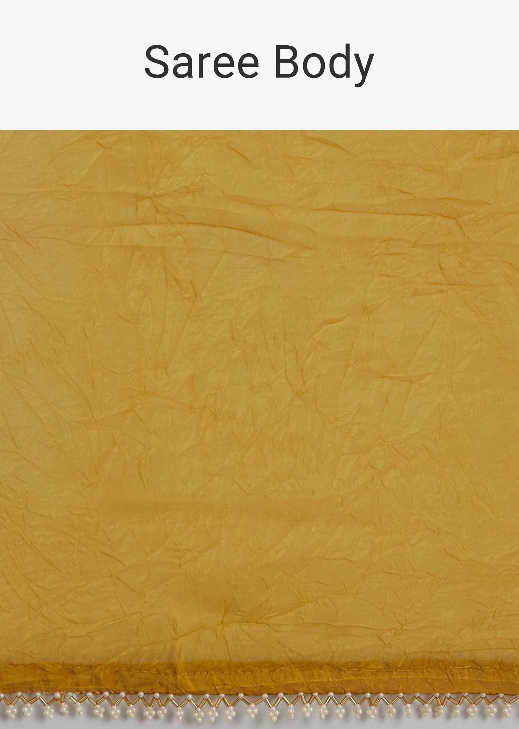 Mustard Yellow Crushed Tissue Saree With Moti Cutdana Embellished Border