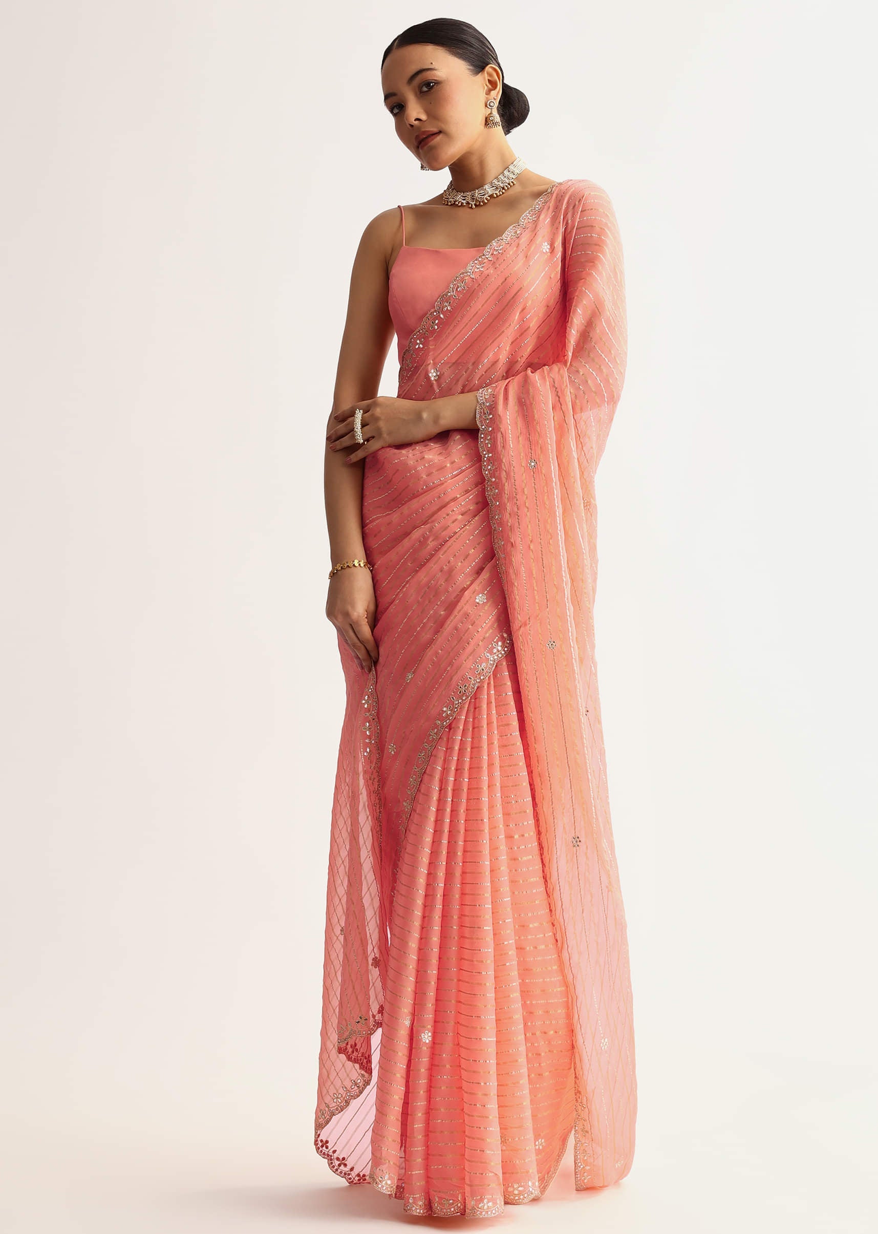 Peach Georgette Scallop Bordered Saree With Foil Printed Stripes