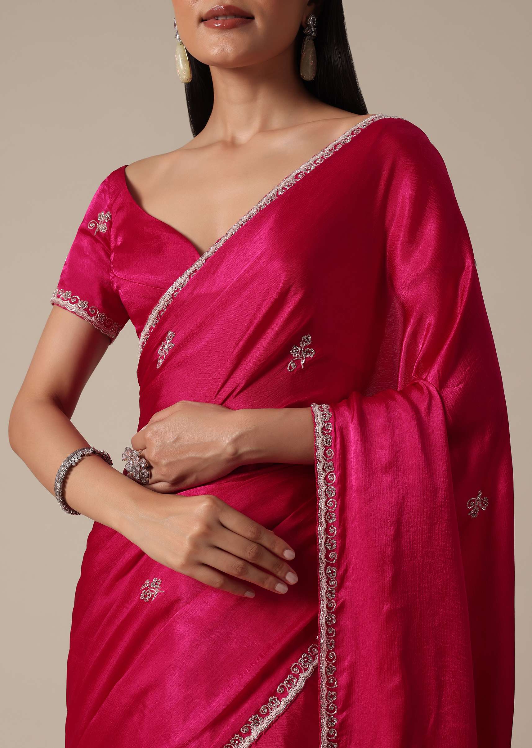 Radiant Pink Saree With Stone Embellishments All Over