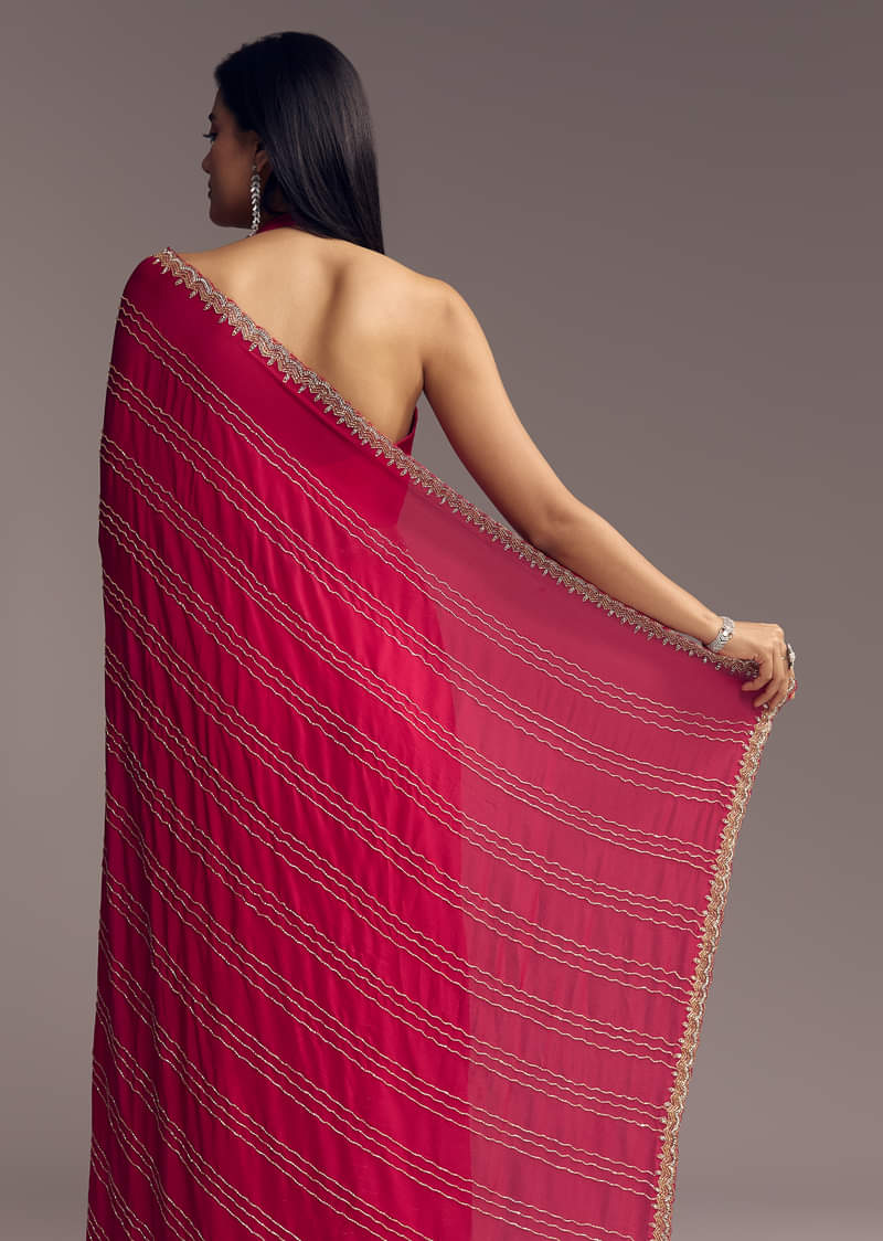 Rani Pink Embroidered Chinon Saree With Cut Dana