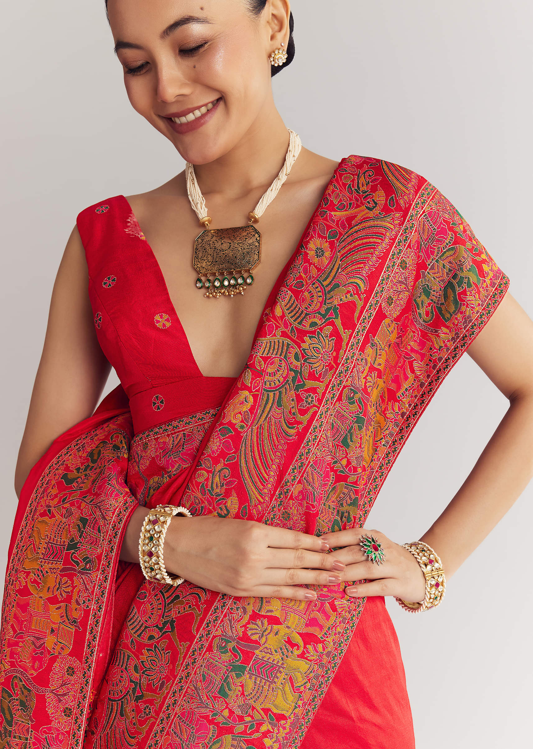 Red Saree With Traditional Floral And Animal Prints