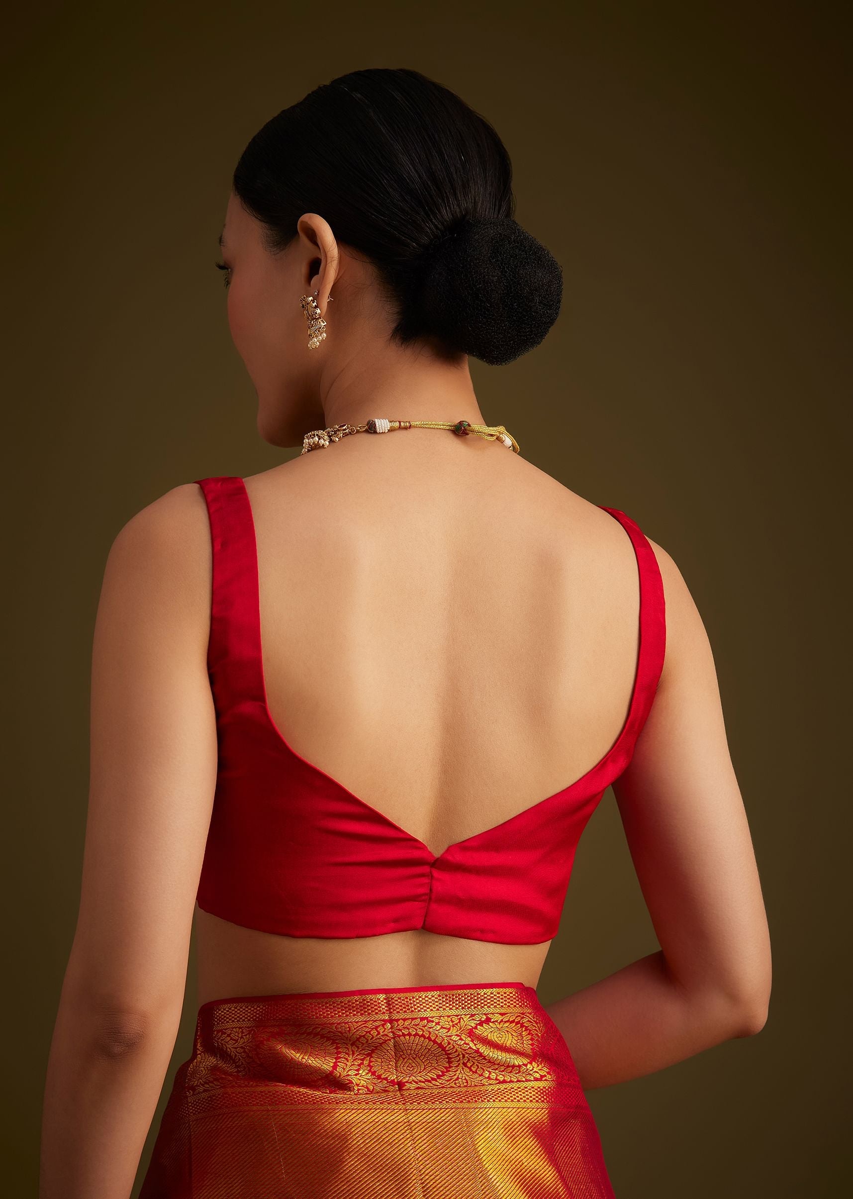 Red Kanjivaram Silk Saree With Golden Zari Detailing