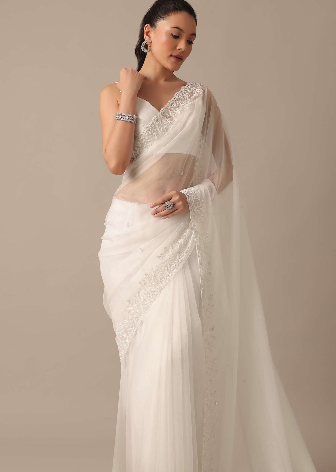 White Organza Saree With Bead Work Border And Unstitched Blouse Piece