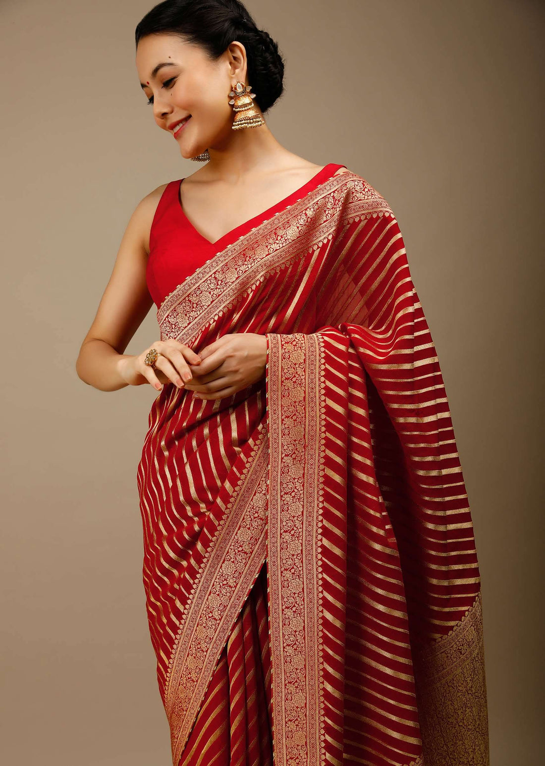 Tomato Red Saree In Georgette With Brocade Woven Diagonal Stripes And Floral Border