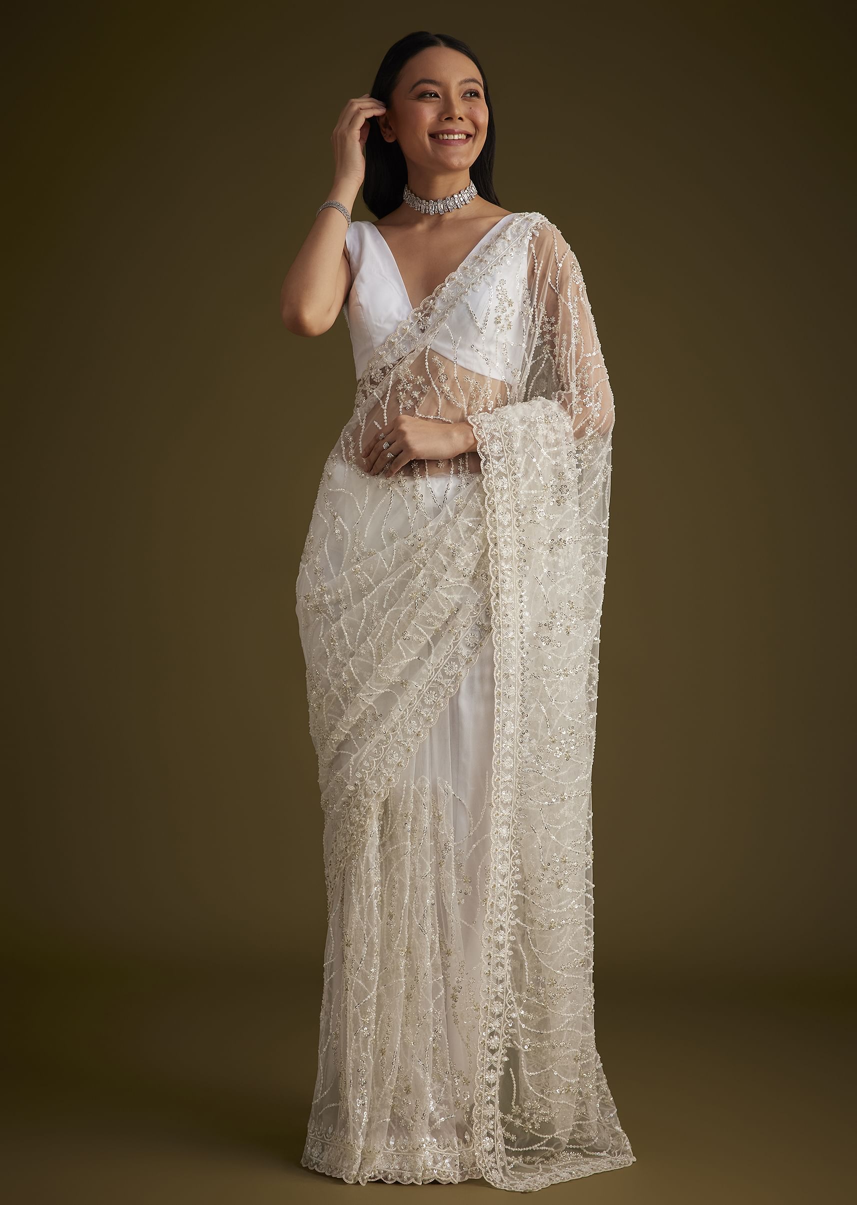 White Net Saree With Sequins And Stones Embroidery